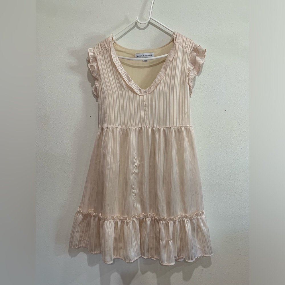 Emma & Michele Ivory Textured dress with ruffles and lining, new without tags.